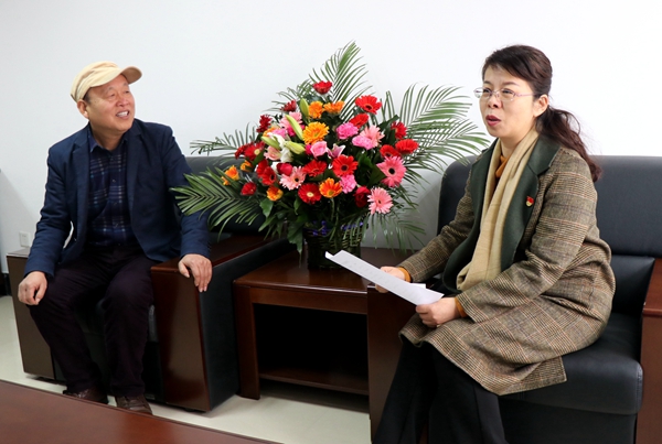 于燕慰問駐馬店拔尖人才周明理、翟書俊